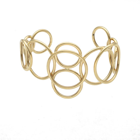 A 14 karat gold-colored bracelet with a geometric circular pattern, displayed against a white background.