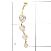 Real Gold belly button ring with four heart-shaped CZ gemstones on a white background under a grid to see the size