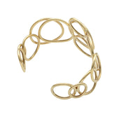 14K yellow gold circles bangle bracelet that embodies timeless elegance and modern sophistication.