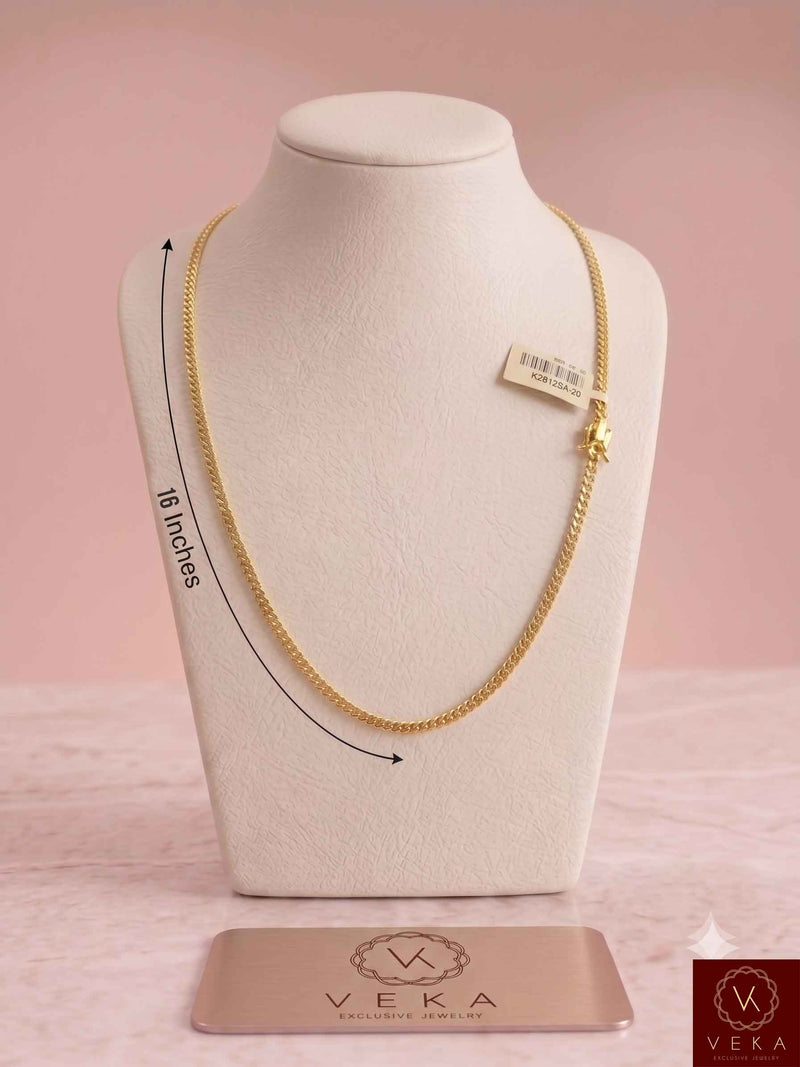 A 16-inch Veka Jewelry 3mm solid Miami Cuban link chain in 14K yellow gold displayed on a white neck bust with a pink studio background.