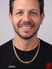Smiling male model wearing a 6mm 14k real gold Cuban link chain in 20 inches length.