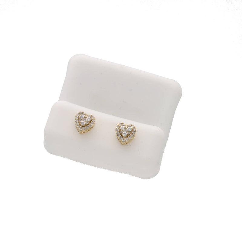 Pair of 7mm 10K yellow gold heart-shaped moissanite stud earrings on a white pad.