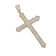 Large slim gold cross charm showing arrow-shaped edges and cubic zirconia coverage