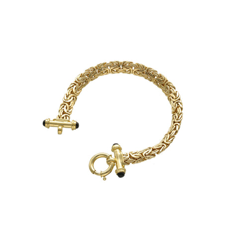 10K yellow gold Byzantine bracelet with a round clasp displayed on a professional white background.