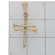 Clean, high-resolution product shot detailing the dual crossed nails motif, polished pointed tips, and precise stone setting in authentic 14K gold.