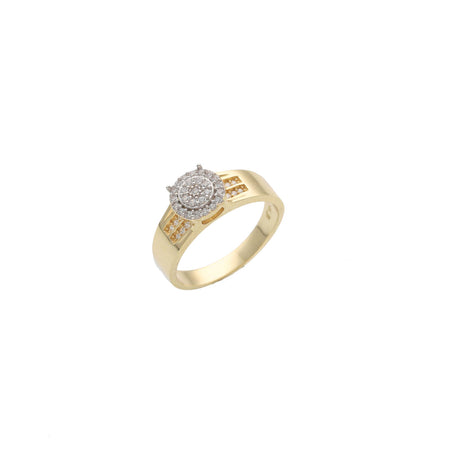 An Elegant 14 Karat Gold Ring featuring a circular cluster of sparkling stones on top, with additional ones set along the band, displayed agains a neutral gray background.