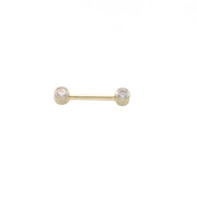 A 14 karat gold straight barbell piercing adorned with cubic zirconia on both ends.