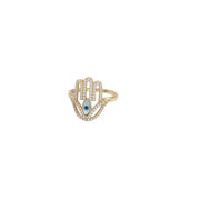 A 14 Karat gold ring featuring a Hamsa hand design with encrusted zircons.