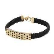 A 14 karat gold leather bracelet with a lobster lock clasp, crossed in a figure-eight style, displayed on a white background.