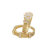 Side view of 14K gold duo wedding ring set with maze design and zirconia stones on white background