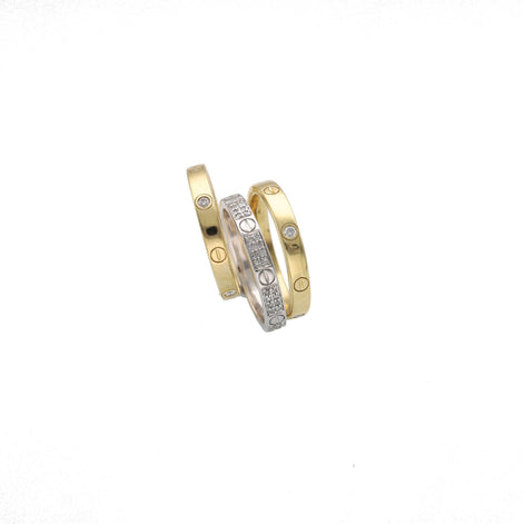 Mens Three gold rings  set with diamond accents on a white background.