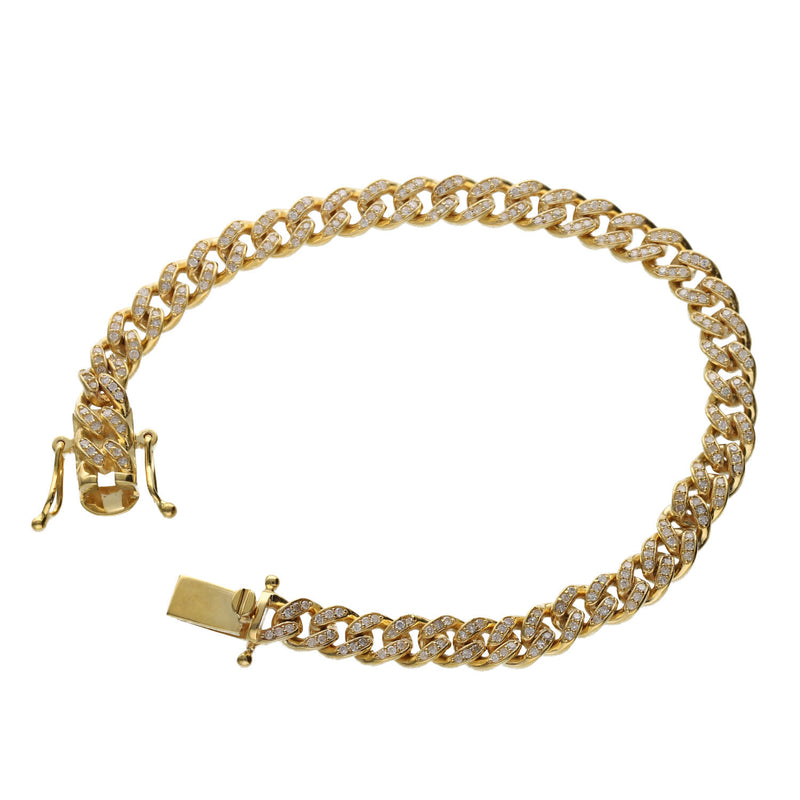10K gold Miami Cuban link bracelet with diamonds for women on white background 
