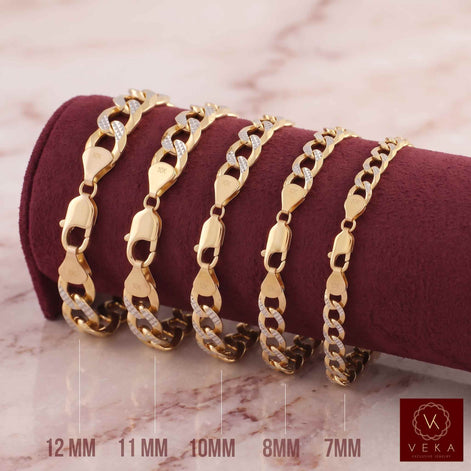 On Pillow Solid Two Tone 14k Gold Cuban Link Men Pave Bracelet with alternating clear crystal and gold links, displayed on a dark burgundy velvet cylinder. The image shows size labels at the bottom (12MM, 11MM, 10MM, 8MM, 7MM) and a Veka Jewelry logo in the bottom right corner.
