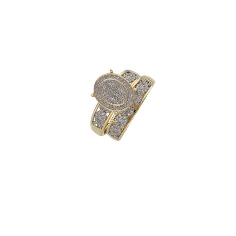 A 14 karat gold ring with a central engagement ring surrounded by a ceremony smaller band, both set with natural diamonds.