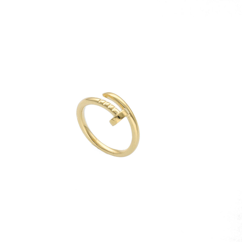 A simple yet elegant yellow gold ring with a nail-like protrusion on one side, in a white background