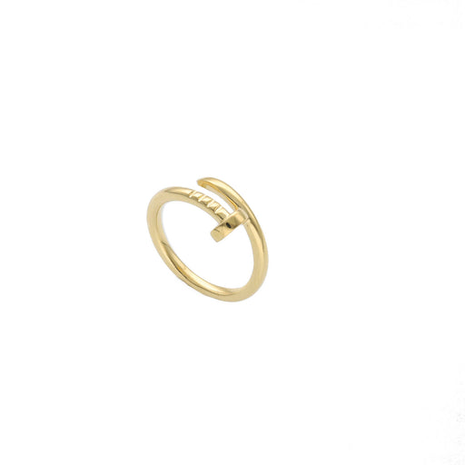 A simple yet elegant yellow gold ring with a nail-like protrusion on one side, in a white background