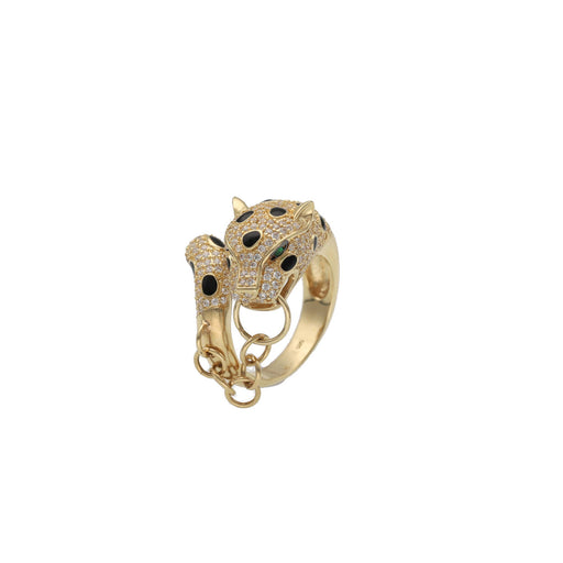 A 14 karat gold ring designed with a leopard motif, featuring small stones including green stones and a gold chain from face to tail.