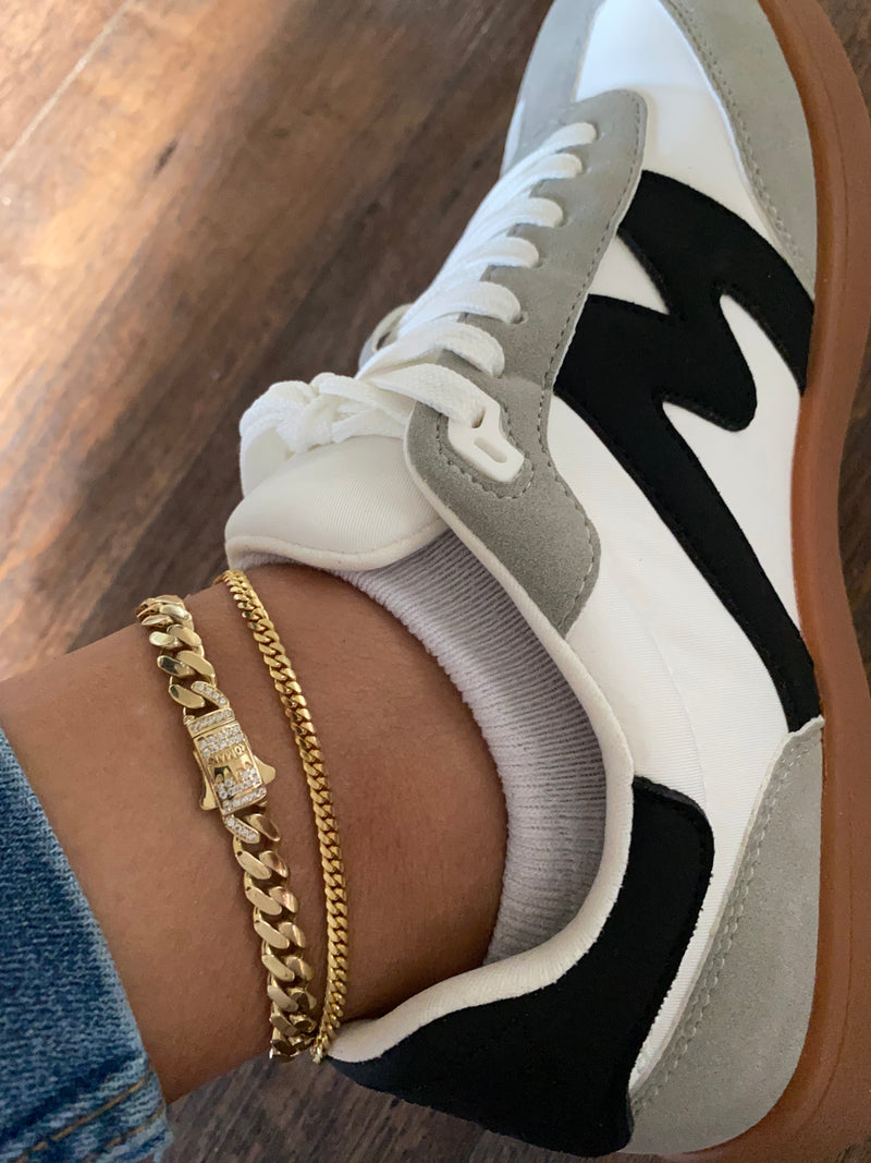 14 Karat Ankle Bracelets. The  bigger one is the one listed where you can see how it looks combined with others.