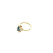 14K yellow gold blue zircon ring with clear accent stones in halo setting - sapphire blue birthstone ring by VEKA JEWELRY