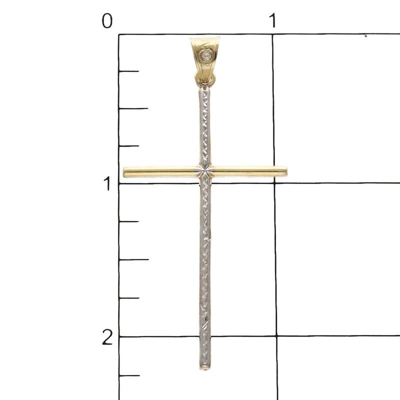 10 Karat Real Two Tone Gold lightweight Cross with a ruler for size reference  and one stone in the bail.