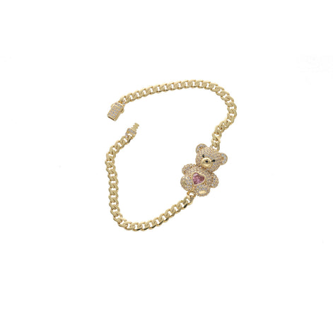 10K yellow gold Cuban link bracelet with adorable teddy bear charm featuring a pink heart on tummy on white background