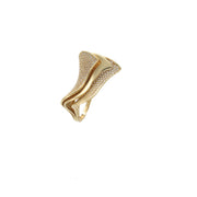 Close-up detail of 14K gold sculptural wave ring showing sparkling cubic zirconia stones and flowing design