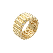 Luxury 14k yellow gold barrel ring featuring intricate interior gold lattice work and 14k hallmark