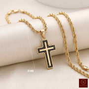 14k yellow gold small cross 35mm tall with black stones around in a 1,5 diameter yellow gold rope chain. (chain not included)