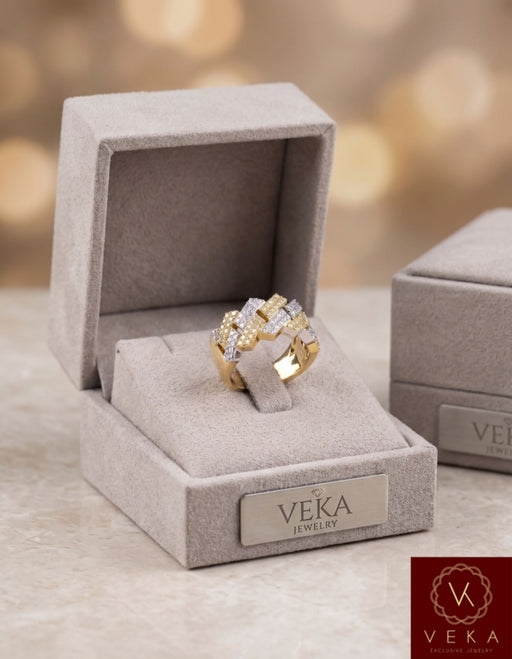 Luxury grey velvet gift box featuring a 10K yellow and white gold diamond Cuban link ring by VEKA Jewelry.