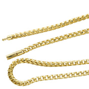 A detailed macro close-up showcasing the diamond-cut facets, tightly woven links, and secure barrel clasp mechanism of the 10K yellow gold Franco chain.