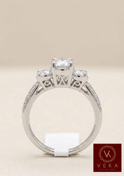 Profile view showing the intricate ZEI setting and brilliant side diamonds of a 14K white gold engagement ring