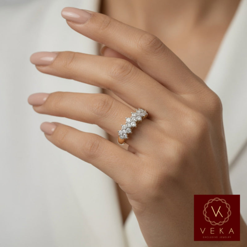 Beautiful woman’s hand wearing the Exquisite 14K Yellow Gold Diamond Honeycomb Ring with 1.10 carat total weight of sparkling round diamonds. Elegant 14k yellow gold band. Fine jewelry by Veka Jewelry.
