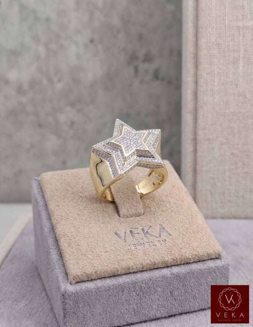 Men's 10K yellow gold 7/8 CTW diamond star statement ring in a light grey suede VEKA Jewelry display box, featuring meticulous pave diamond setting