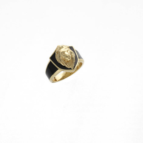 Gold and black ring with a lion head design on a white background
