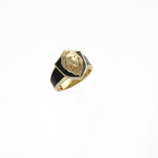 Gold and black ring with a lion head design on a white background