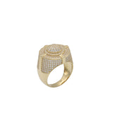 Close-up view of a heavy men's ring made of 14k yellow gold, featuring a round face and thick band completely paved with clear cubic zirconia stones and screw-head details against a plain white background.