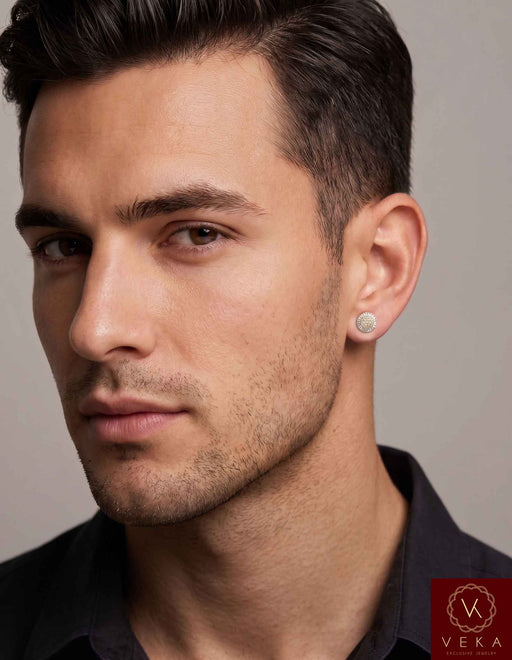 Side profile model wearing a 7mm men's round and baguette diamond stud earring in solid 10K gold