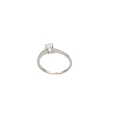 Back view of a minimalist 14K gold band with a single 0.30 carat natural diamond stone