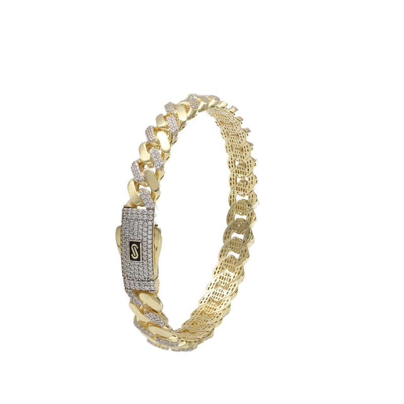 Side profile of a real 10k gold Monaco bangle highlighting the premium craftsmanship and Swarovski-set safety clasp