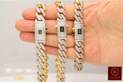 Close-up view of two hands displaying three different widths of 10K gold Monaco chain bracelets to compare size and pavé diamond coverage.