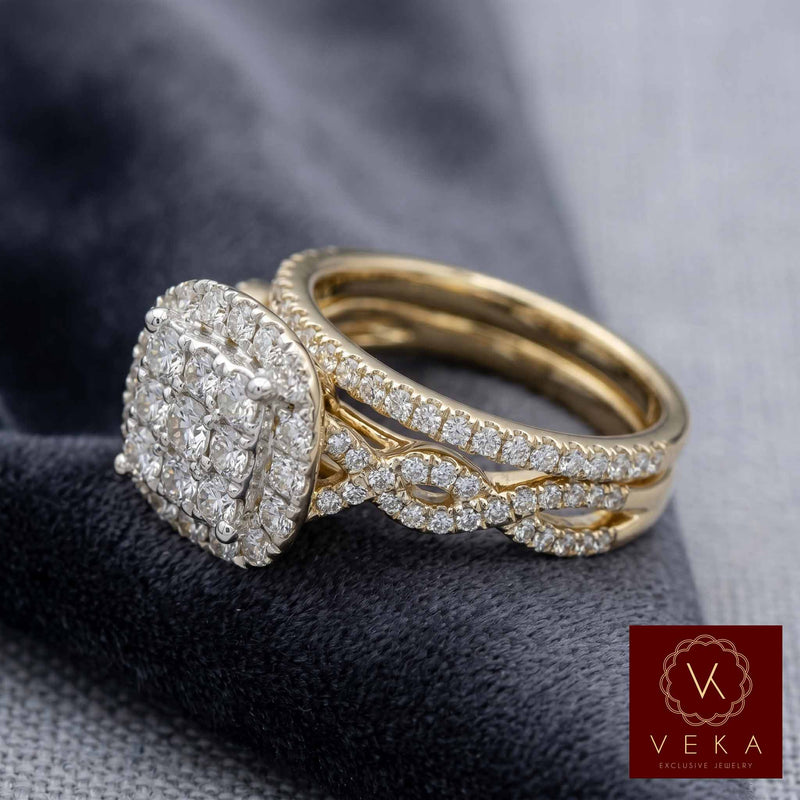 Close-up of a 1.5 CTW natural diamond halo engagement ring and matching wedding band stack.