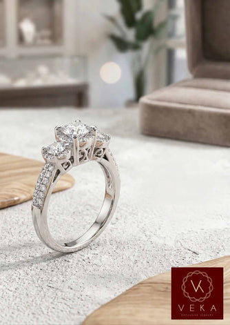 Side view of a 0.80 TCW natural diamond three-stone engagement ring in 14K white gold by VEKA Jewelry