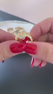 Video showcase of 14k Yellow Gold Ribbed Barrel Ring reflecting light on 12mm wide statement band
