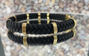 14k-solid-gold-braided-black-leather-mens-bracelet-vidfeo-rotating on a mirrior
