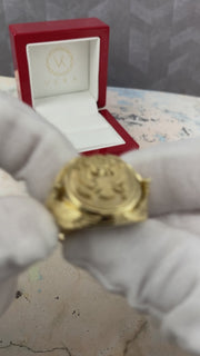 A heavy men's 14k yellow gold ring featuring an embossed Great Seal of the United States on a shield face and sculpted eagles on the sides, resting on a red display box.
