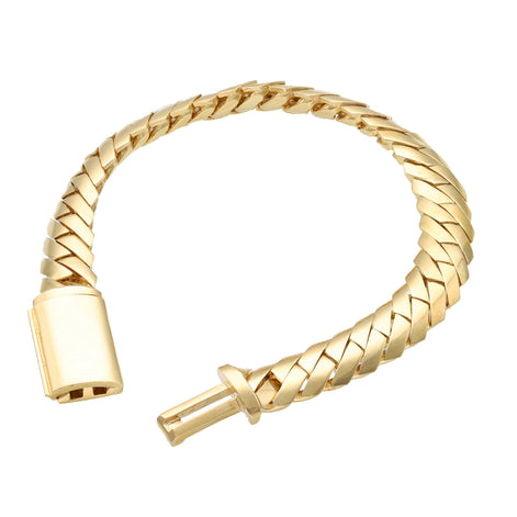 Gold braided bracelet on a white background