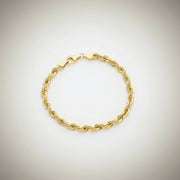 Top view of a men's 10k gold 6mm thick rope chain bracelet from the Veka Jewelry collection