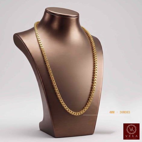 Solid 10K yellow gold Franco chain necklace displayed on a luxury bronze bust by Veka Jewelry