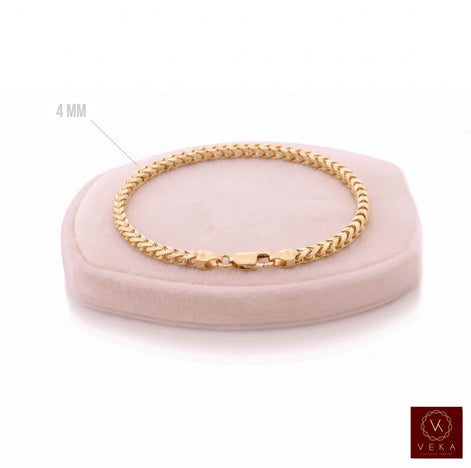 Veka Jewelry solid 14k diamond cut yellow gold franco men's bracelet 4mm on a pink jewelry display with Veka logo
