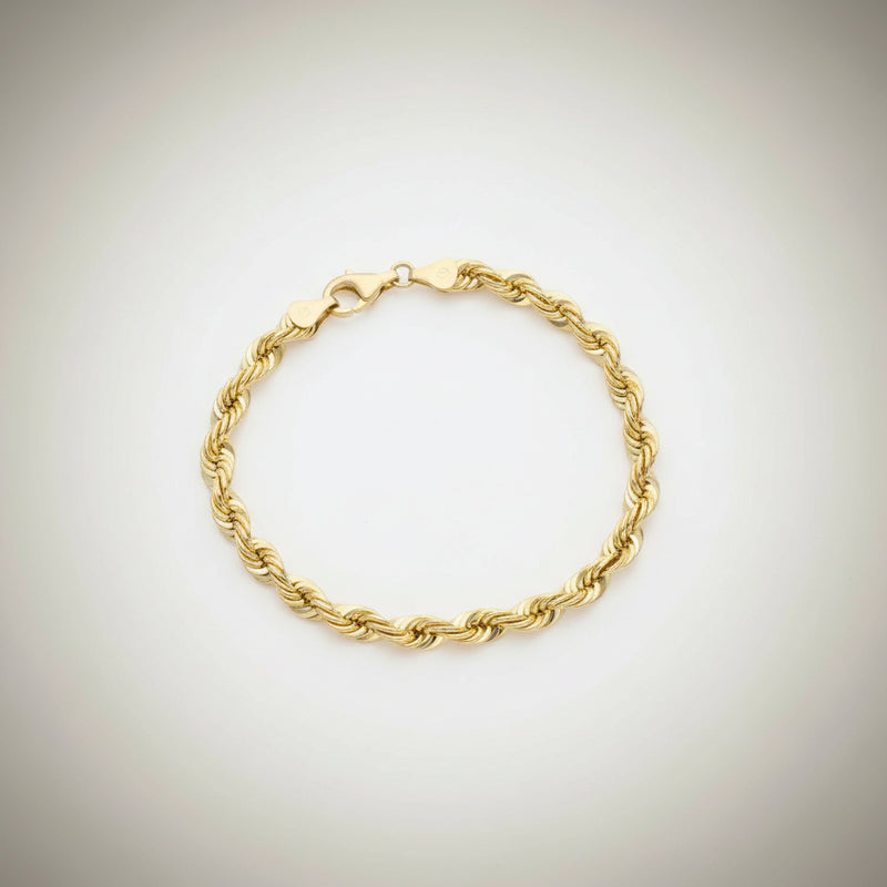 Top view of a men's 14k gold 6mm thick rope chain bracelet from the Veka Jewelry collection